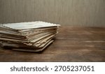 A stack of old letters on the table.Write letters.Send a mail envelope.
