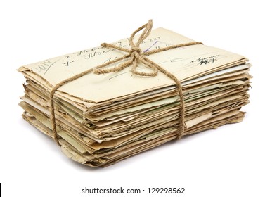 Stack of old letters on white background