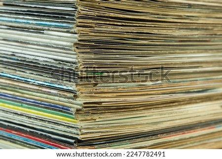 A stack of old LP record covers. Art and a piece of contemporary history. Unlike streaming music, you take the record cover in your hand and immerse yourself in the emotional world of the music.