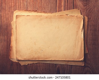 Stack Old Papers On A Wooden Table