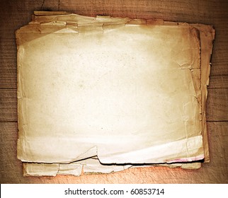 Stack Old Papers On A Wooden Table