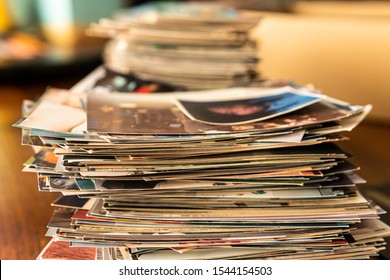 Stack Of Old Photo Prints And Memories To Be Digitized A