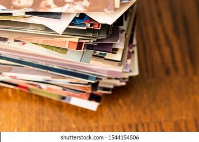 Stack Of Old Photo Prints And Memories To Be Digitized A