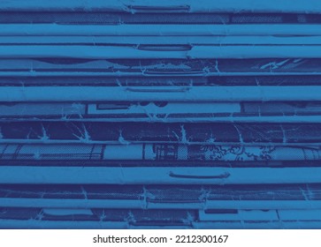 Stack Of Old Vintage Comic Books Creates A Colorful Background Texture With Blue Monotone Effect