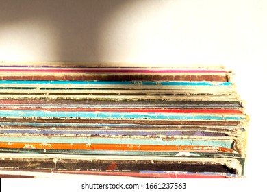 Stack of old vinyl records. closeup.  Pile of old dusty vinyl records.