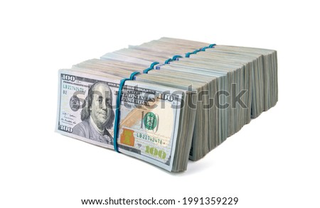 Stack of one hundred dollar bills close-up.