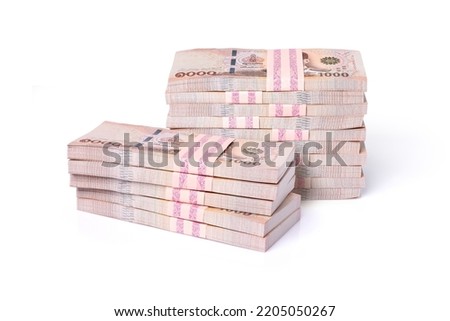Stack of one million five hundred thousand thai baht banknote money isolated on white background.