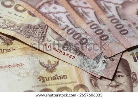 Stack of one thousand Thai baht banknotes