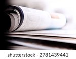 stack of open magazines on white background