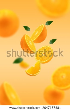 Stack of Orange falling or flying.Creative levitation food on orange color background with vertical frame