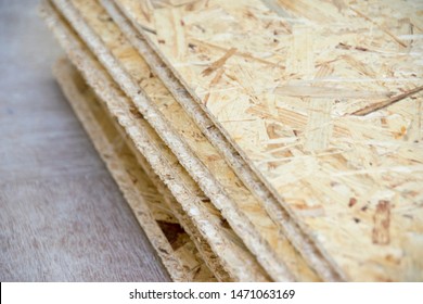 A stack of OSB sheets stacked one on another - Shutterstock ID 1471063169
