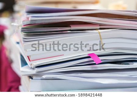 Stack overload documents report papers research classroom on teacher desk waiting approve from advisor check, Annual Reports document for evaluation in student study or business paperless concept