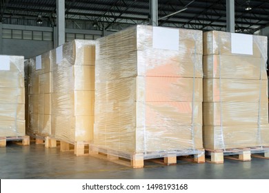 stack package boxes wrapping stretch plastic on pallet at storage warehouse, cargo shipment delivery, business industrial transportation, 