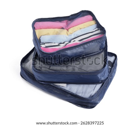 Stack of packing cubes isolated on white