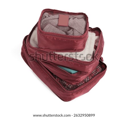 Stack of packing cubes isolated on white