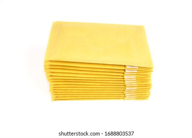 A stack of padded envelopes isolated on white. Top side view