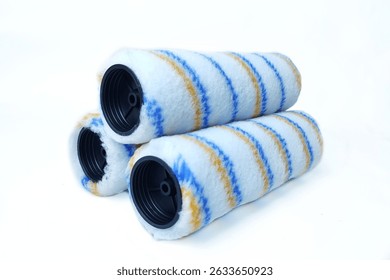 Stack of Paint roller brush refill isolated on white background with copy space. Construction tools. 