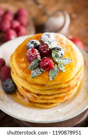 Stack of pancakes with fresh berries, close-up