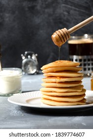 Stack Of Pancakes With Honey