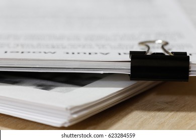 Stack Of Paper With Clip