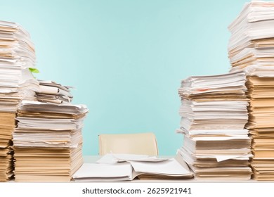 Stack of paper on desktop in office. -image