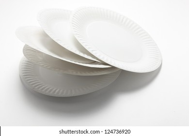 Stack of Paper Plates on Seamless Background