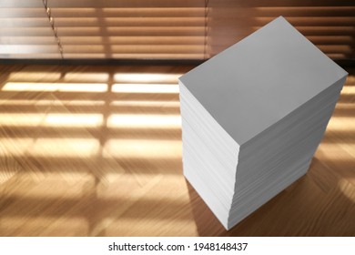 Stack Of Paper Sheets On Wooden Table, Above View