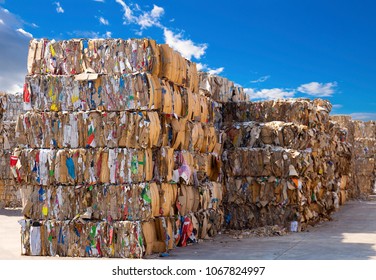 Stack Of Paper Waste Before Shredding At Recycling Plant