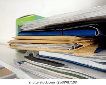 Stack of papers, books, notes, work, office, archive.