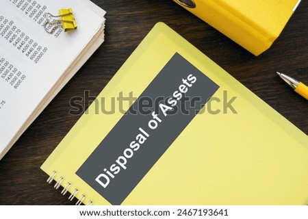 Stack of papers and Disposal of assets book.