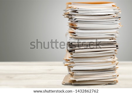 Stack of papers isolated on white background