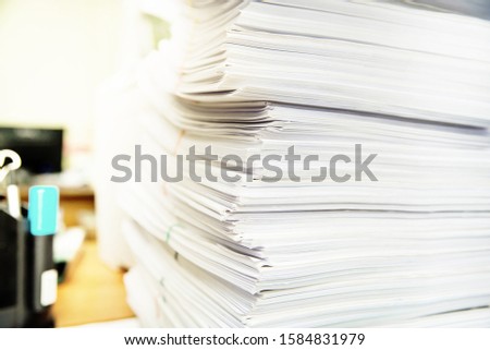 Stack of papers in the office on the table