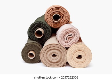 Stack of pastel color fabric rolls isolated on white, Synthetic and natural fabrics with copyspace - Shutterstock ID 2057252306