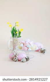 A stack of pastel macarons on a cake stand. Easter sweets.