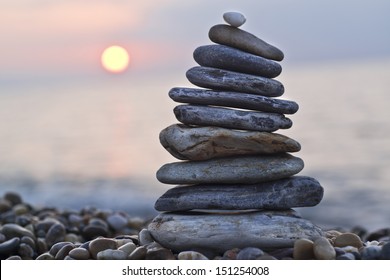 Stack Of Pebbles On Beach