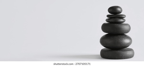 Stack of pebbles on grey background with space for text. Zen concept - Powered by Shutterstock - Get 15% off with code: PIKWIZARD15