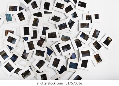 Stack Of Photo Slide On White Background