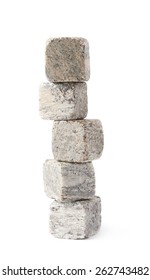 Stack pile of five cooling whiskey granite stones isolated over the white background