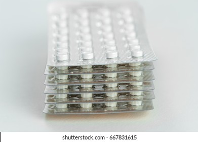 Stack of pills blisters isolated on white background