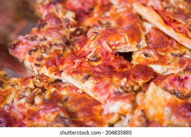 Stack Of Pizza Slices At The Hotel Buffet