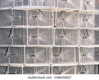 Stack of portable traditional fishing traps for catching octopus, crabs, geometrical pattern