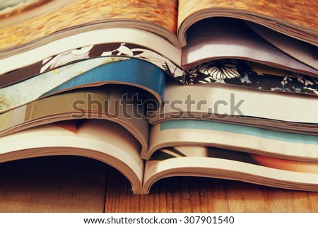 stack of printed magazines
