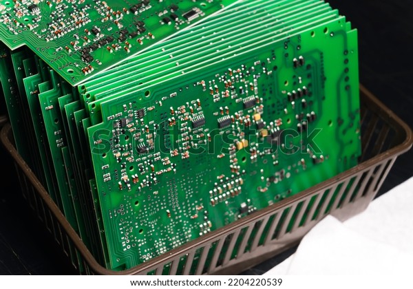  Stack of produced\
printed circuit boards with surface mounted components. . High\
quality photo
