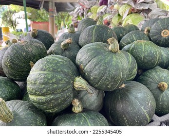 Stack of pumpkins in the market
