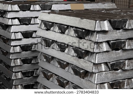 Stack of raw aluminium ingots in aluminium profiles factory