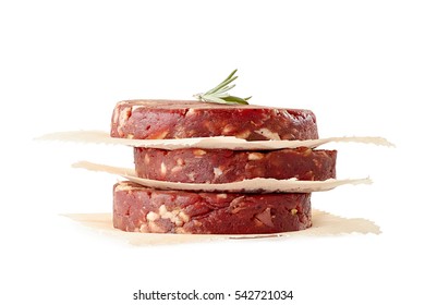 Stack Of Raw Beef Burger Patties On White