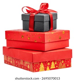 Stack of red and black gift boxes decorated with gold Christmas patterns and red ribbon, isolated on white background. Holiday composition symbolizing celebration, surprise, and festive spirit