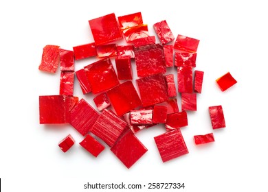 Stack Of Red Glass Mosaic Tiles On White Background