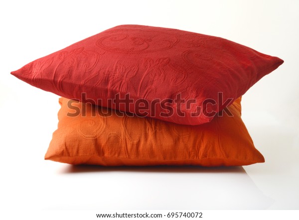 red and orange pillows