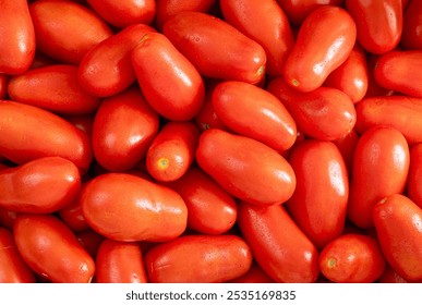 Stack of red plum tomatoes